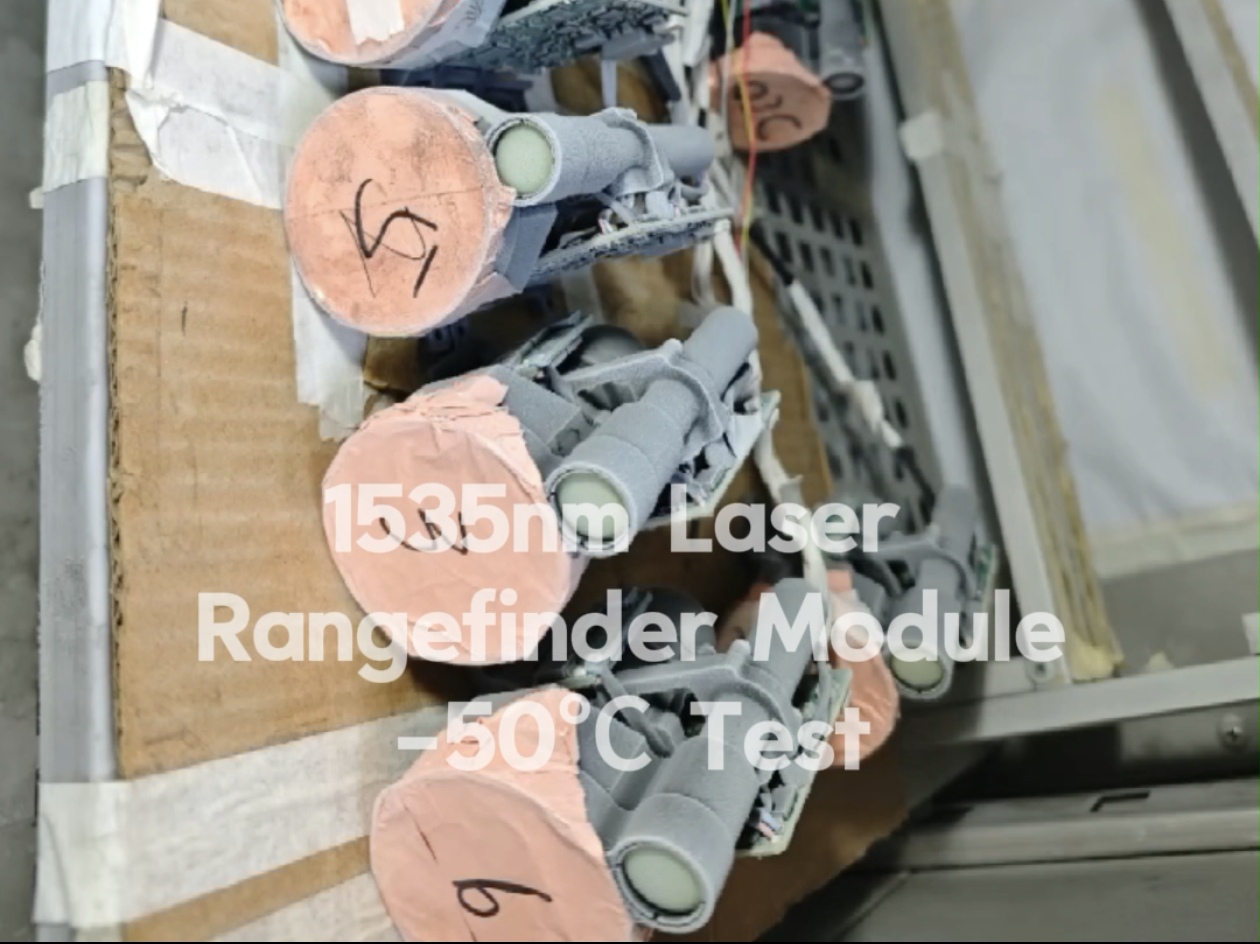 Sunflaser 1535nm eye-safe laser rangefinder module undergoing stability testing in an environmental chamber set to -50 degrees Celsius.